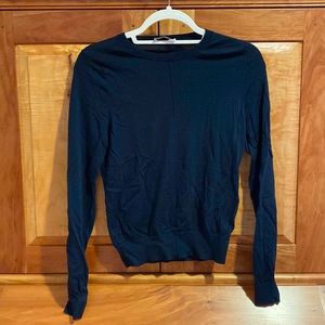 Closed navy blue wool sweater